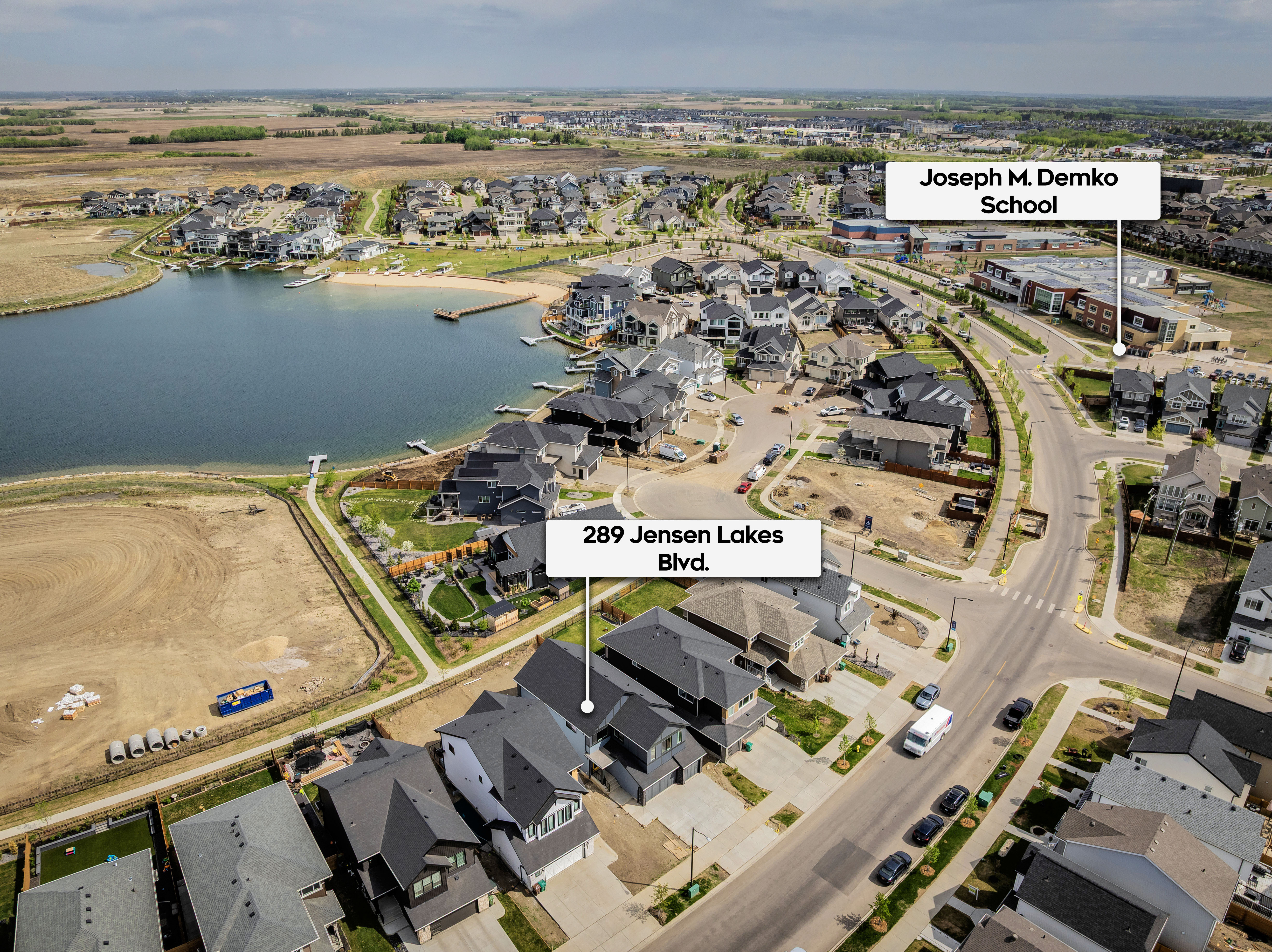 Aerial view of 289 Jensen Lakes Blvd in St. Albert with homes for sale by Holland and Associates Real Estate.